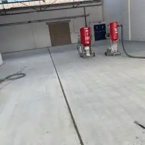 Shot blasting a concrete floor as an alternative to concrete floor grinding